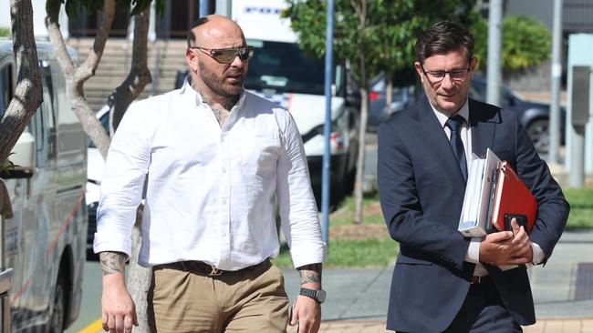 Tama David Lewis (left) arrives at Southport District Court on Thursday, January 30, with his lawyer Michael Gatenby. Picture: Glenn Hampson.