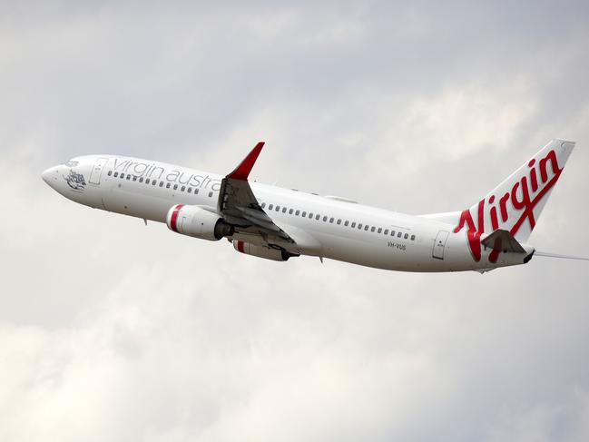 SYDNEY, AUSTRALIA - NewsWire Photos OCTOBER 08, 2020 - A Virgin Australia plane takes off at Sydney Airport on Thursday October 08, 2020.Picture: NCA NewsWire / Christian Gilles