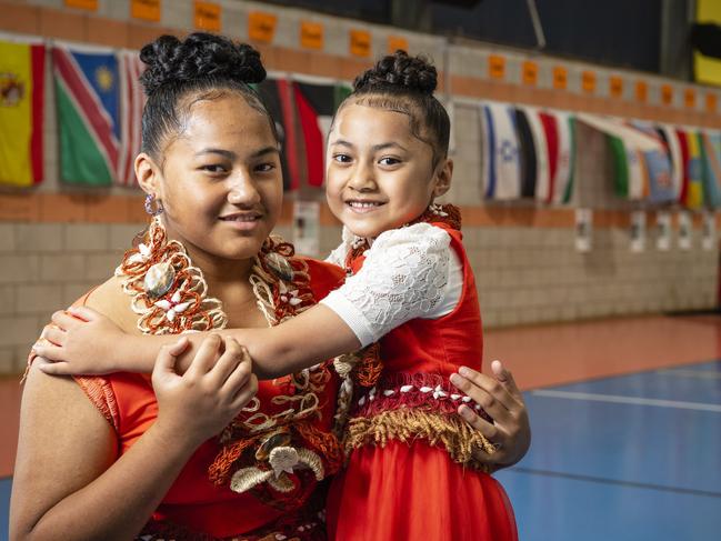 Sisters Tapaita (Yr1) and Hifo (Yr6) Leaaemanu represent Tonga at Harmony Day celebrations at Darling Heights State School. Picture: Kevin Farmer