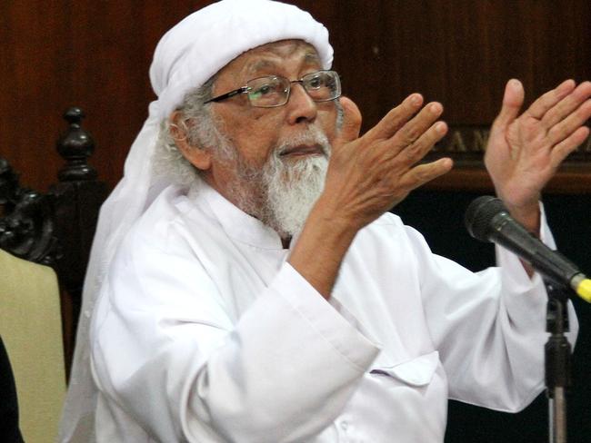 Jailed Indonesian cleric Abu Bakar Bashir in 2016 gesturing during a court appearance in Cilacap, Central Java. Picture: AFP