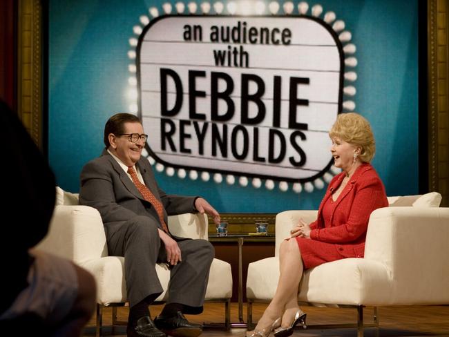 TV personality Bill Collins and actor Debbie Reynolds in a scene from TV show ‘Bill Collins Presents: An Audience with Debbie Reynolds’. Picture: Supplied