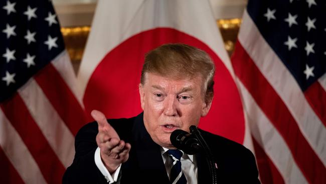 US President Donald Trump speaks during a meeting with business leaders in Tokyo on May 25, 2019. - US President Donald Trump arrived in Japan on May 25 for a four-day trip likely to be dominated by warm words and friendly images, but relatively light on substantive progress over trade. (Photo by Brendan Smialowski / AFP)