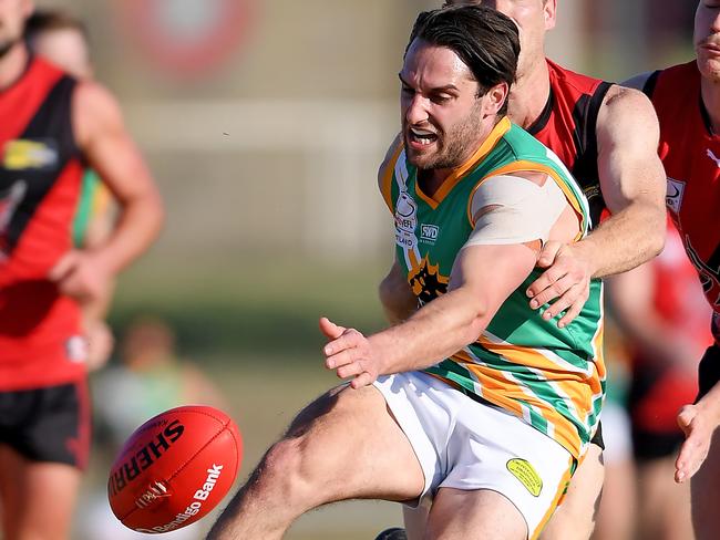 Metin Musa gets the ball on the boot for Mooroolbark. Picture: Andy Brownbill