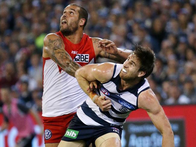 Lance Franklin and Tom Lonergan go toe-to-toe. Picture: Colleen Petch