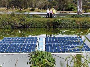 INNOVATION: Lismore City Council's water and wastewater manager Matt Torr, environmental strategies officer Sharyn Hunnisett and council consultant Michael Qualmann at East Lismore Sewage Treatment Plant where a community funded floating solar project will be placed. (Image shows what floating solar project will look like). Picture: Cathy Adams