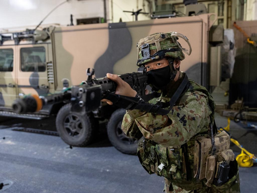 Ground Combat Element personnel from the Japan Self-Defense Force conduct wet and dry environmental rehearsal training onboard Royal Australian Navy ship HMAS Canberra, during Exercise Talisman Sabre 2021.