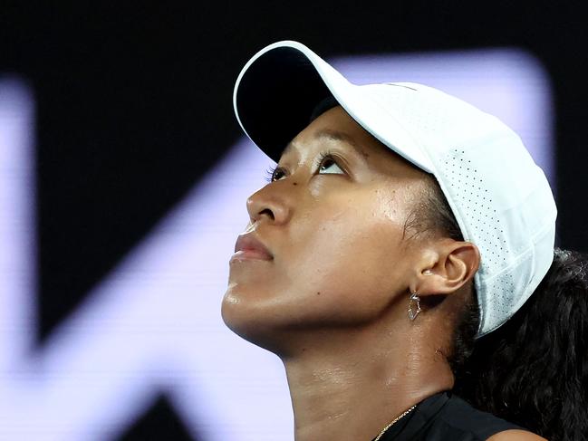 Japan's Naomi Osaka reacts on a point against France's Caroline Garcia during their women's singles match on day two of the Australian Open tennis tournament in Melbourne on January 15, 2024. (Photo by David GRAY / AFP) / -- IMAGE RESTRICTED TO EDITORIAL USE - STRICTLY NO COMMERCIAL USE --