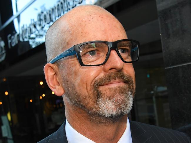 Former Victoria Police Chief Commissioner Simon Overland departs the Royal Commission into the Management of Police Informants at the Fair Work Commission in Melbourne, Tuesday, January 21, 2020. (AAP Image/James Ross) NO ARCHIVING