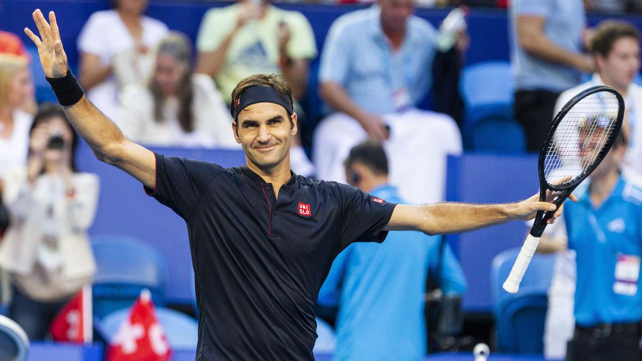 Roger Federer soaks up the crowd’s applause at the Hopman Cup. 