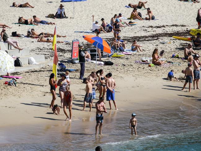 People on Cronulla beach last month ignoring the governments new distancing laws. Picture: Matrix