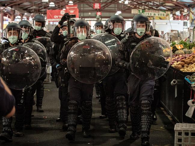 MELBOURNE, AUSTRALIA - SEPTEMBER 13: A heavy police presence is seen at the Queen Victoria Market on September 13, 2020 in Melbourne, Australia. Anti-lockdown protesters organised a "freedom walk" to demonstrate against Melbourne's current Stage 4 COVID-19 restrictions. While organisers claim the gathering is legal, Victoria Police said they would be monitoring protest activity, with anyone considered to be breaching the Chief Health Officer's directives liable for a fine of $1652. Metropolitan Melbourne remains under stage 4 lockdown restrictions, with people only allowed to leave home to give or receive care, shopping for food and essential items, daily exercise and work while an overnight curfew from 8pm to 5am is also in place. The majority of retail businesses are also closed. Other Victorian regions are in stage 3 lockdown. The restrictions, which came into effect from 2 August, were introduced by the Victorian government as health authorities work to reduce community COVID-19 transmissions across the state. (Photo by Darrian Traynor/Getty Images)