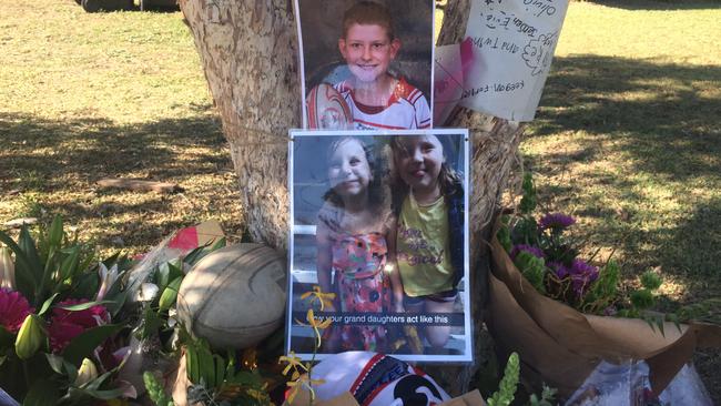 The Singleton community continues to mourn. Flower tributes outside the home.