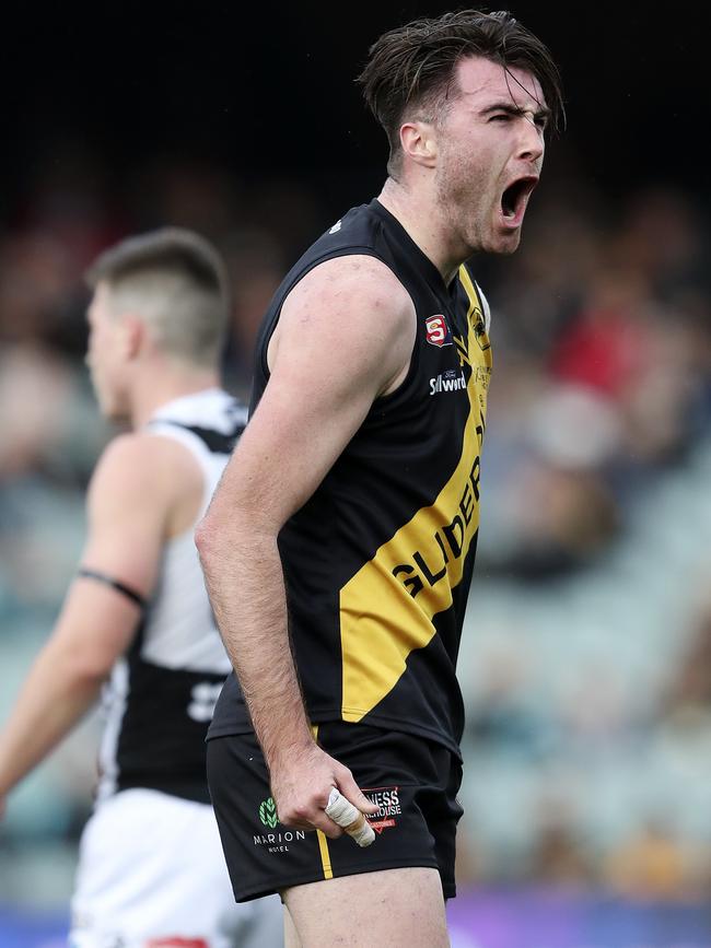 Liam McBean celebrates a goal for Glenelg in the SANFL grand final. Picture: Sarah Reed