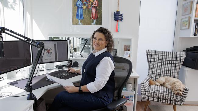 Kirstin Ferguson in her home office with dog Huey on the Sunshine Coast. Picture: Lachie Millard