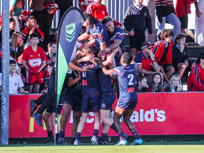 Ipswich SHS players celebrate the win. Picture: NIGEL HALLETT