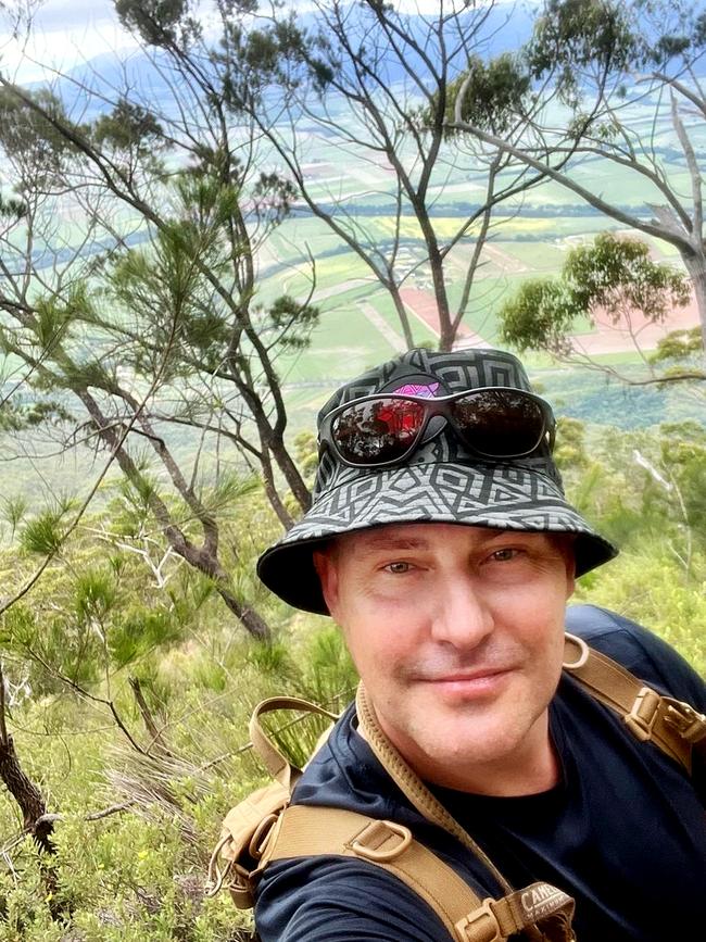 Curtis Pitt hiking up Walshs Pyramid, south of Cairns, this month. Picture: Instagram