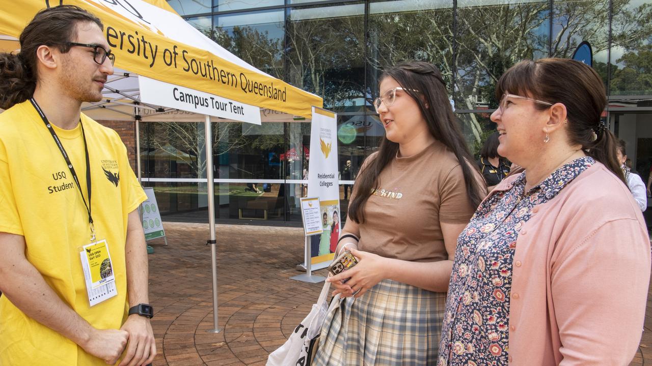 ( From left ) Callum Namour, Kate Beahan and Anna Beahan talk courses at USQ open day. Sunday, August 15, 2021. Picture: Nev Madsen.