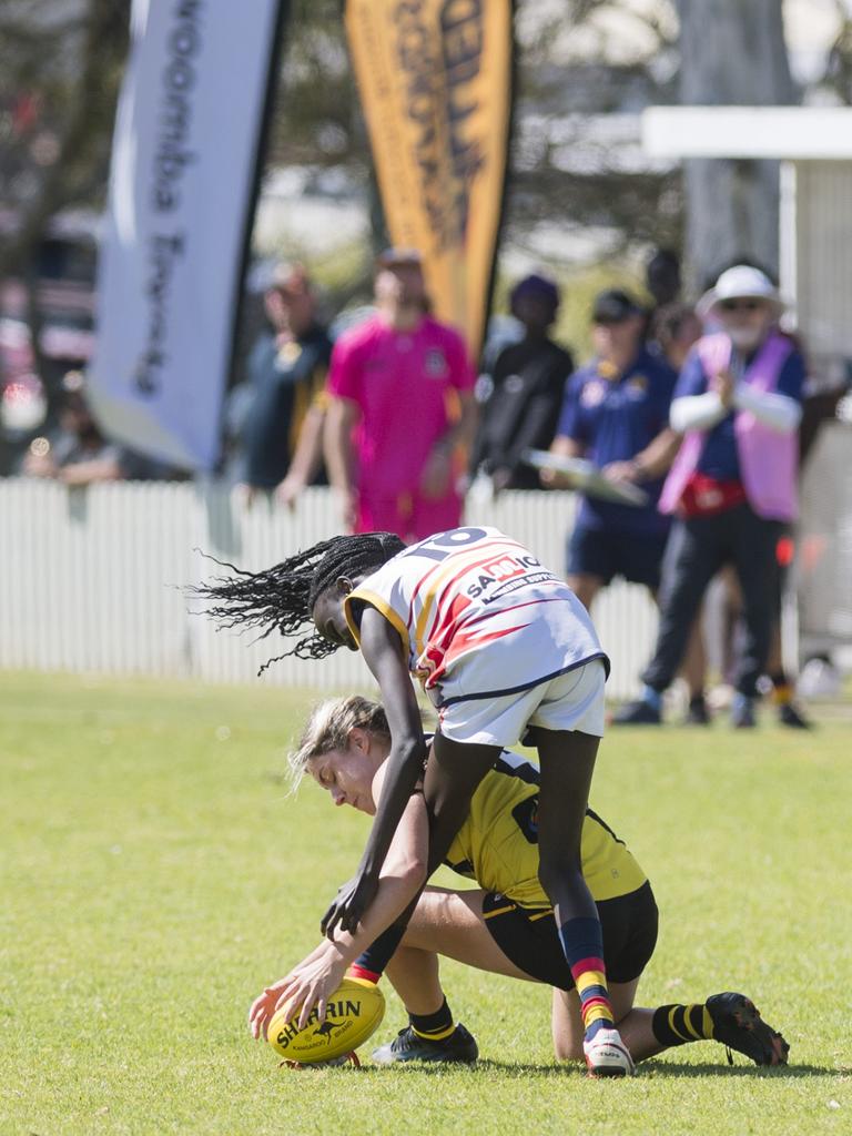 Ellie McCurran (left) of Toowoomba Tigers and Shannon Fagan of University Cougars in AFL Darling Downs Toowoomba Toyota Cup senior women grand final at Rockville Park, Saturday, September 2, 2023. Picture: Kevin Farmer