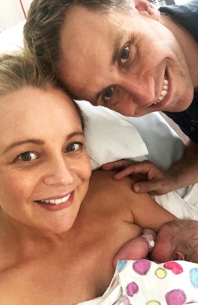 Bickmore and Walker with their new baby daughter Adelaide, who was born in 2018.