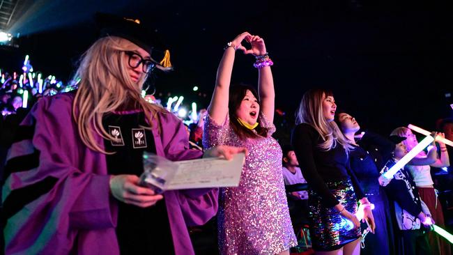 Chinese fans watch a screening of the show.