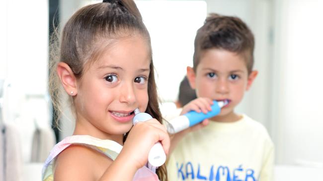 Mary 5yrs and Christian 3yrs Kalligeros, at home brushing their teeth for our fluoride yarn, Mount Gravatt East - on Thursday 16th January 2025 - Photo Steve Pohlner