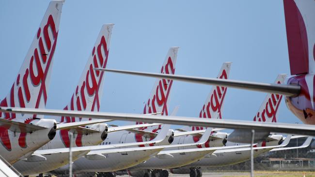 Virgin Australia planes parked on the tarmac at Adelaide Airport. Picture: AAP