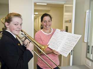 Amelia Webster gets help from mum Elisa Webster before her first performance in the 73rd City of Toowoomba Eisteddfod, Monday, July 30, 2018. Picture: Kevin Farmer