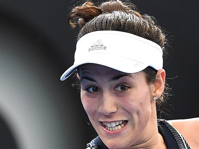 Garbine Muguruza of Spain in action during her second round match against Aleksandra Krunic of Serbia at the Brisbane International Tennis Tournament in Brisbane, Tuesday, January 2, 2018. (AAP Image/Dave Hunt) NO ARCHIVING, EDITORIAL USE ONLY