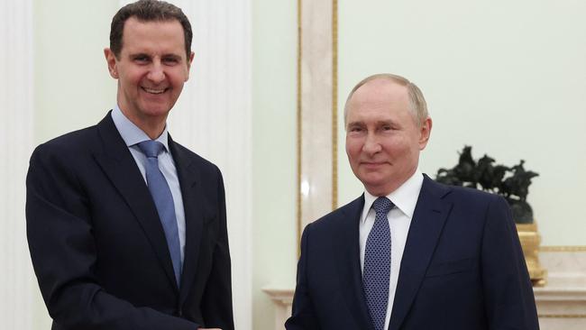 Russia's President Vladimir Putin (R) shakes hands with his Syrian counterpart Bashar al-Assad during their meeting at the Kremlin in Moscow on July 24, 2024. Picture: AFP