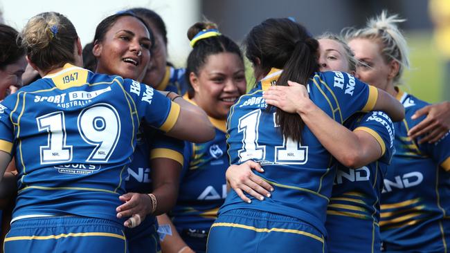 SYDNEY, AUSTRALIA - AUGUST 26: Mahalia Murphy of the Eels celebrate victory with teammates following during the round six NRLW match between Parramatta Eels and North Queensland Cowboys at Netstrata Jubilee Stadium on August 26, 2023 in Sydney, Australia. (Photo by Jason McCawley/Getty Images)