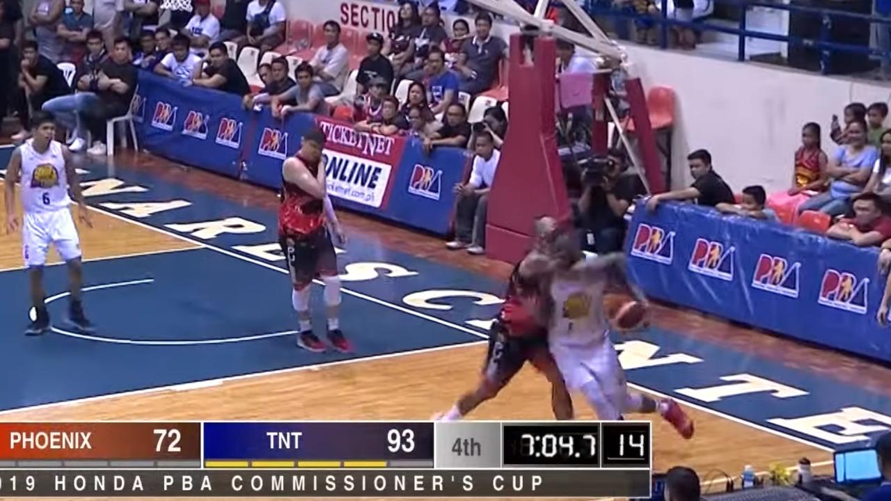 Crazy clothesline shot sees players run in from everywhere.
