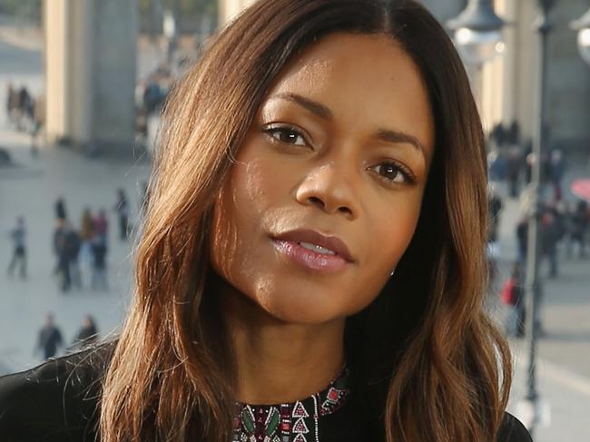 BERLIN, GERMANY - OCTOBER 28:  (EXCLUSIVE COVERAGE) UK actor Naomie Harris stands with the Brandenburg Gate behind during a photocall prior the German premiere of the new James Bond film 'Spectre' at Hotel Adlon on October 28, 2015 in Berlin, Germany.  (Photo by Sean Gallup/Getty Images for Sony Pictures)