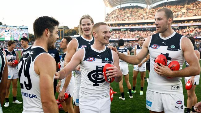 ADELAIDE, AUSTRALIA - APRIL 06: Matthew Cottrell of the Blues celebrates with teammates during the 2024 AFL Round 04 match between the Fremantle Dockers and the Carlton Blues at Adelaide Oval on April 06, 2024 in Adelaide, Australia. (Photo by Michael Willson/AFL Photos via Getty Images)