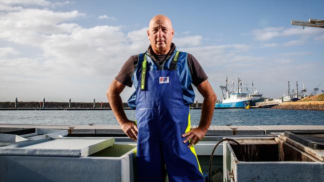 Professional fisherman Craig Fletcher with his boat at the Wallaroo boat ramp. Picture: Matt Turner.