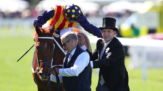 Trainer Chris Waller (right) and jockey James McDonald celebrate Nature Strip’s victory in the Group 1 King’s Stand Stakes at Royal Ascot in June 2022. Picture: Alex Livesay / Getty Images