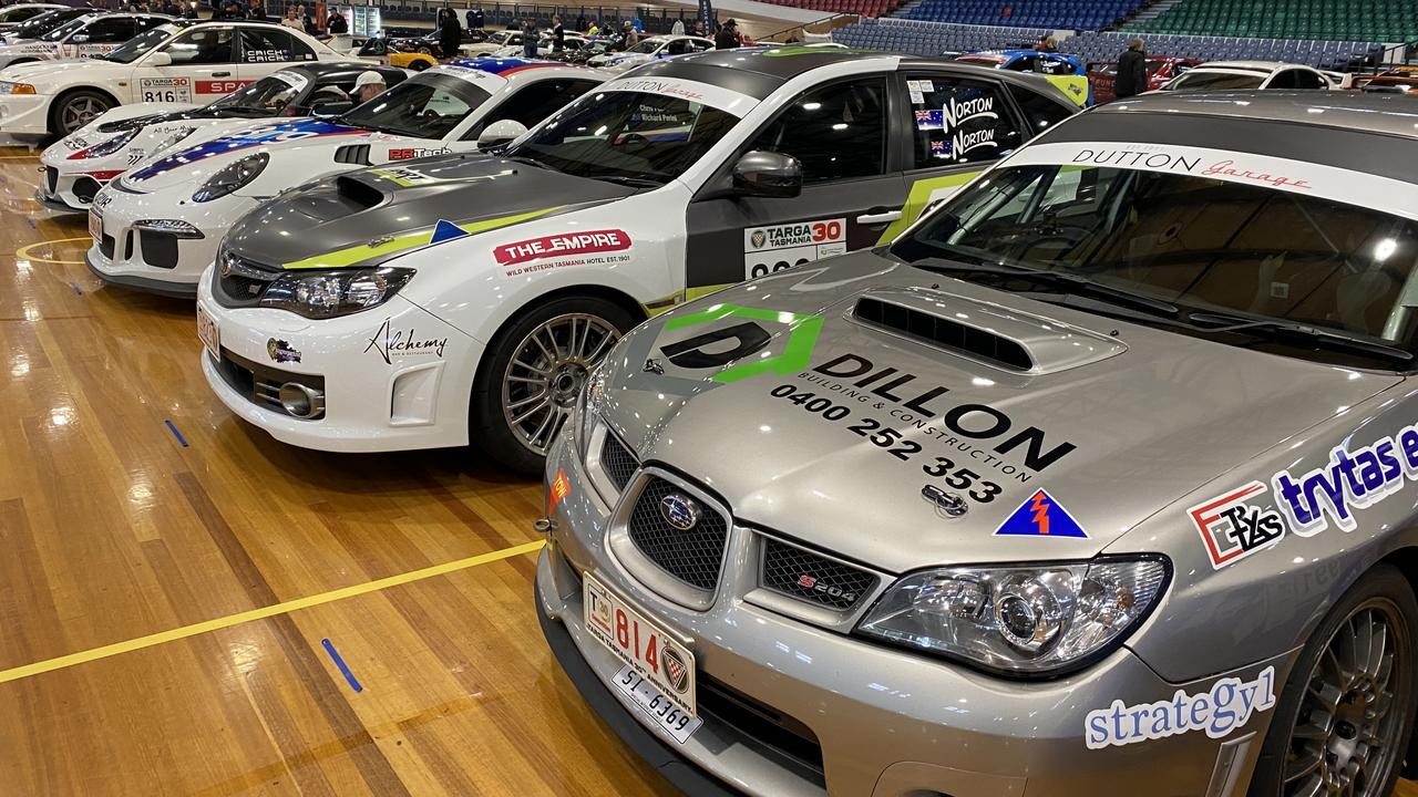 Targa Tasmania competition cars remain in the Silverdome after the event was cancelled. Picture James Bresnehan