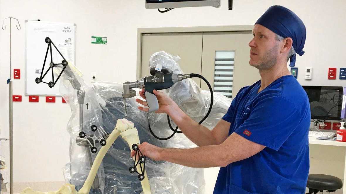 NEW TECH: Dr Alan Loch demonstrates St Vincent's Private Hospital Toowoomba's new orthopaedic robot. Picture: Contributed