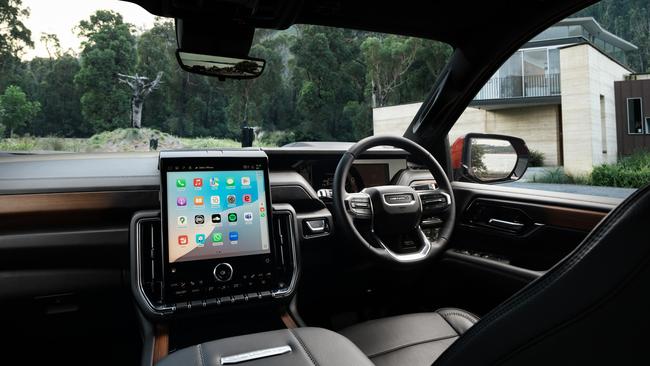 Inside the Yukon is luxurious with hi-tech, dual rear entertainment screens and a panoramic sunroof. Picture: GMC