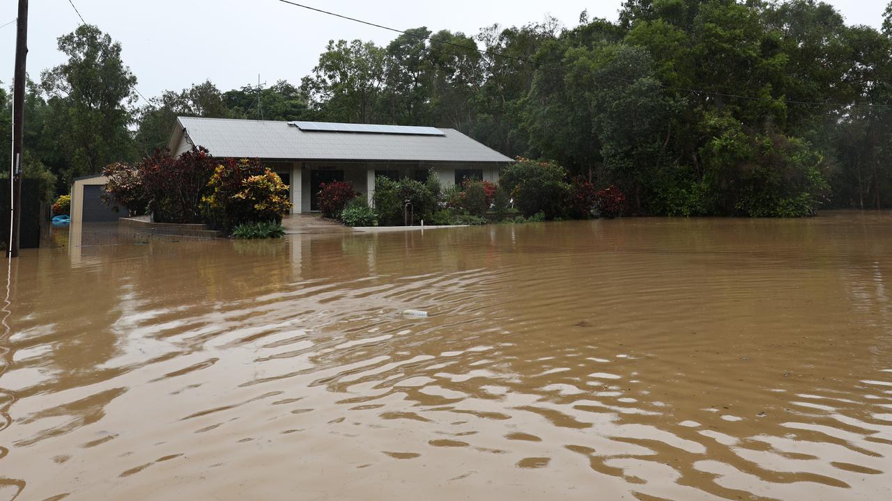 Ted Fay and Pam Fay's Clitheroe Street home was inundated by flood water on Sunday night and left covered in mud. Picture: Brendan Radke