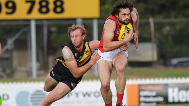 Josh Scott tackles Cameron Shenton. Picture: Russell Millard/AAP