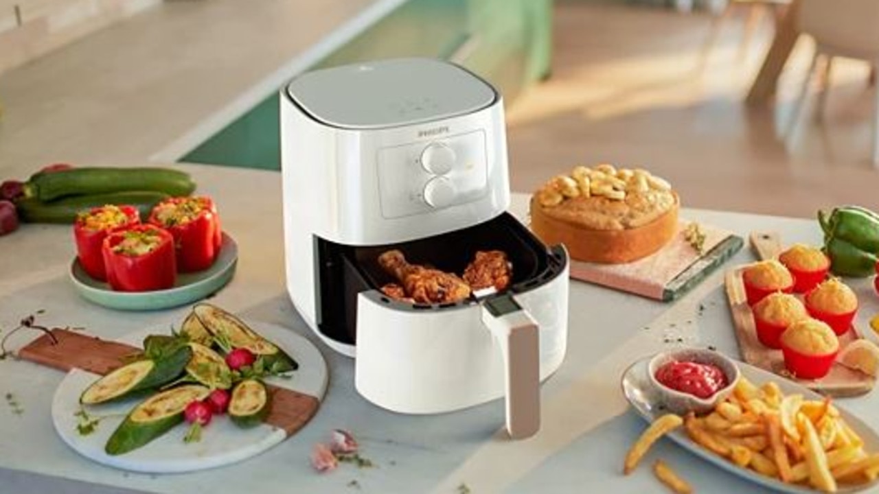 Philips Essential 4.1L Air Fryer with cooked meals. Picture: Philips