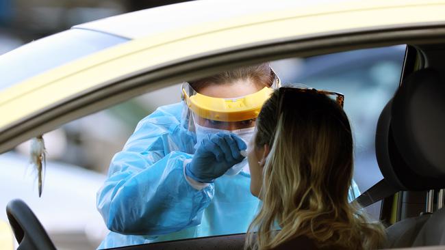 A driver gets tested for Covid-19 at Caloundra. Picture: Lachie Millard