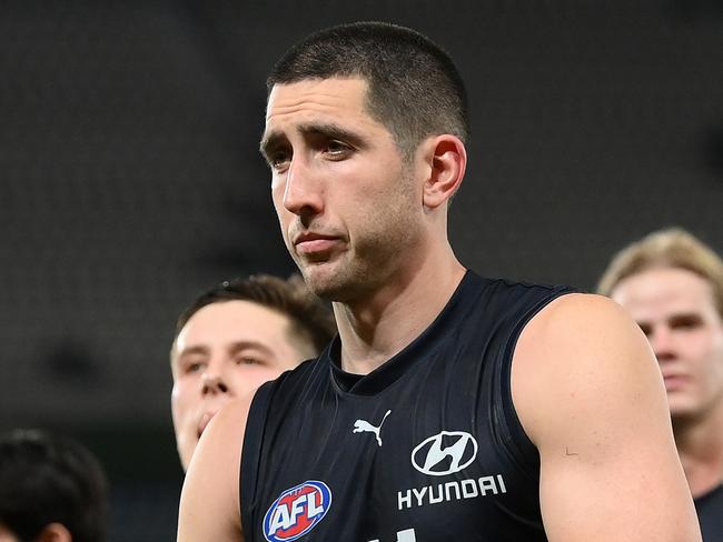 MELBOURNE, AUSTRALIA - AUGUST 27: Jacob Weitering and his Blues team mates look dejected after losing the round 24 AFL match between Carlton Blues and Greater Western Sydney Giants at Marvel Stadium, on August 27, 2023, in Melbourne, Australia. (Photo by Quinn Rooney/Getty Images)