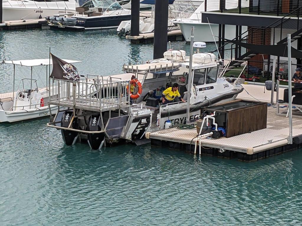 Workplace Health and Safety Queensland investigators are inspecting a fishing charter boat where three crew members were injured after an explosion at Coral Sea Marina on May 9, 2024. Picture: Estelle Sanchez