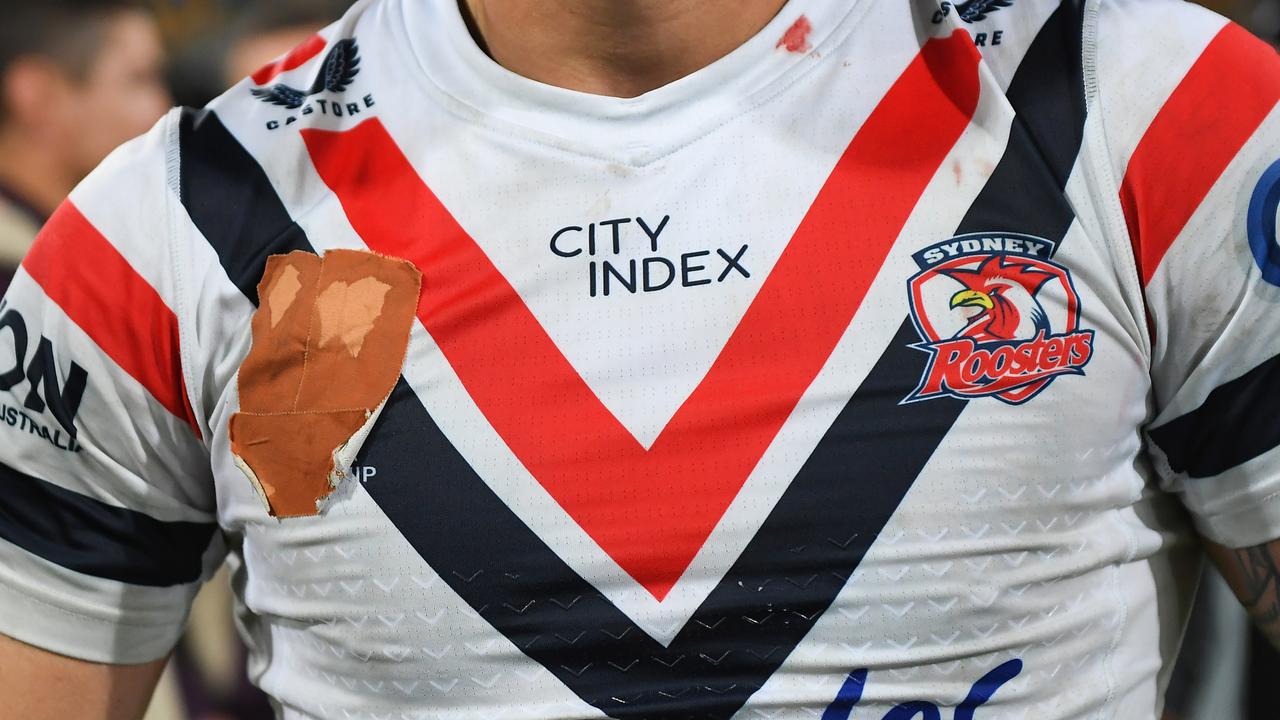 A Roosters shirt is seen with the NRL logo covered during the round 22 NRL match between Brisbane Broncos and Sydney Roosters. Picture: Getty Images