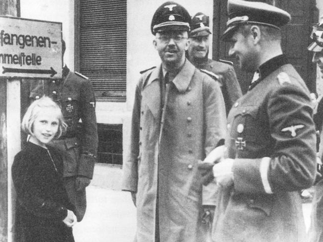 Nazi leader Heinrich Himmler and his daughter Gudrun visiting a concentration camp.