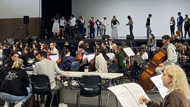 Featured and backing vocalists and students taking part in the CGEN orchestra rehearsed at Mansfield State High School on Saturday ahead of 2024 Creative Generation – State Schools Onstage. Picture: Supplied