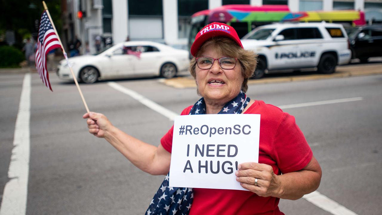 A woman protests against government closures of non-essential businesses due to the coronavirus in Columbia, South Carolina. Picture: Sean Rayford/Getty Images/AFP