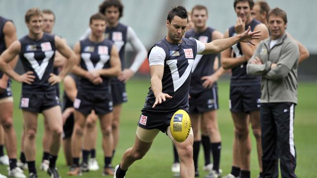 Jimmy Bartel kicks at Victoria training in 2008. Picture: AAP Image/Andrew Brownbill