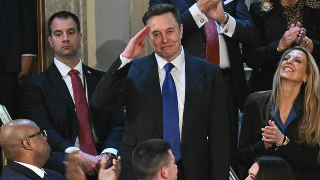 The t-shirt was replaced by a professional suit for Donald Trump's address to a joint session of Congress and the second cabinet meeting. Picture: Saul Loeb/AFP